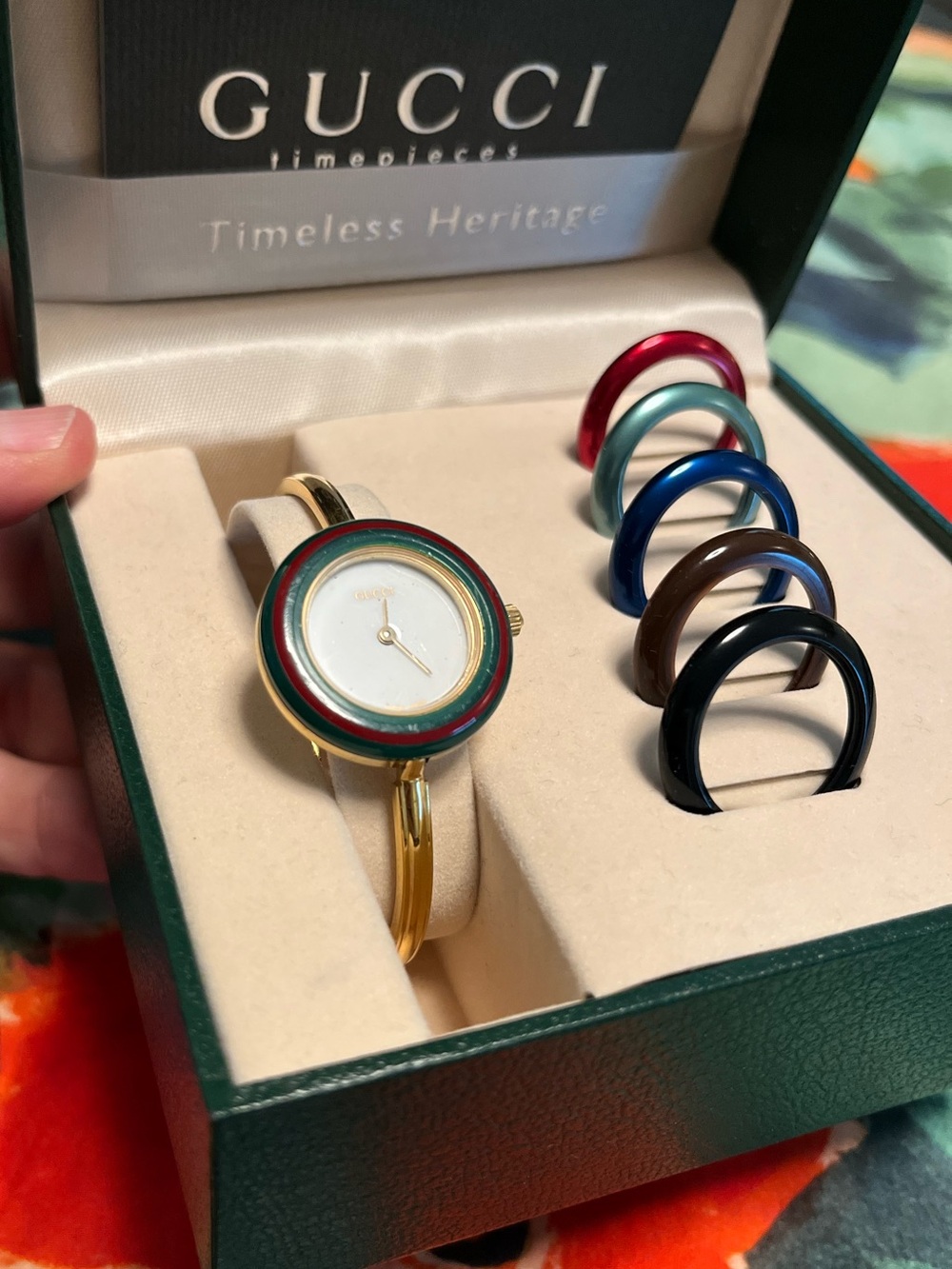 Gucci Gold Bangle Watch with Interchangeable Bezels